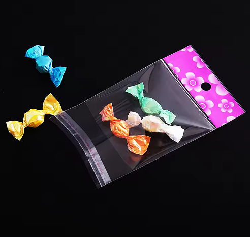 Colorful Printing Biodegradable Opp Customized Cellophane Bags Transparent Gift Packing Self Adhesive Header Bag With Hang Hole