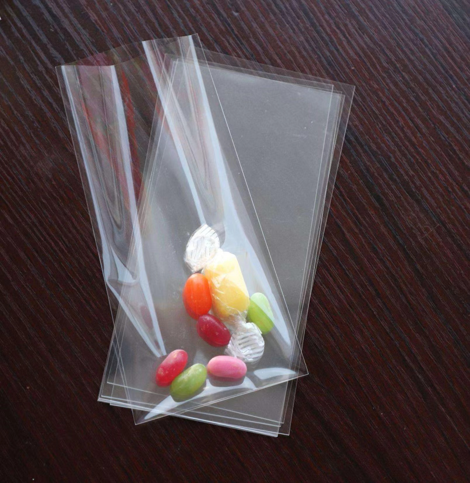 Customized Disposable Flat Mouth Transparent Candies Food Bag